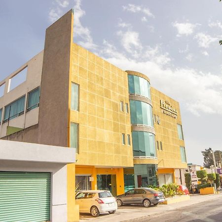 Capital O Hotel Villa Monini Πουέμπλα Εξωτερικό φωτογραφία