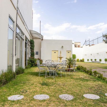 Capital O Hotel Villa Monini Πουέμπλα Εξωτερικό φωτογραφία