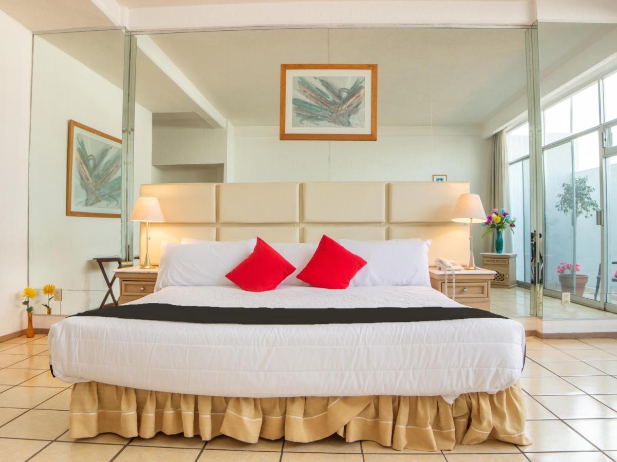 Capital O Hotel Villa Monini Πουέμπλα Εξωτερικό φωτογραφία