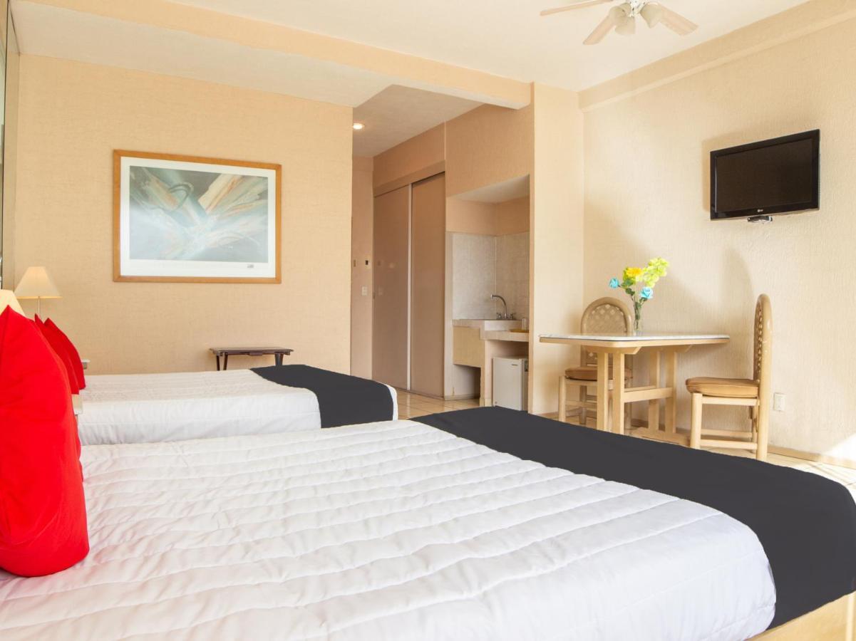 Capital O Hotel Villa Monini Πουέμπλα Εξωτερικό φωτογραφία