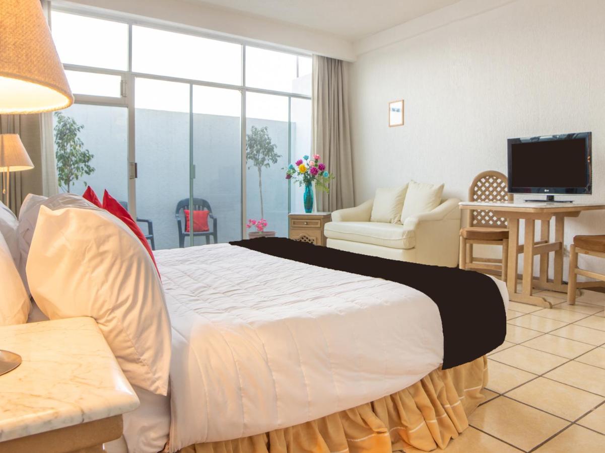 Capital O Hotel Villa Monini Πουέμπλα Εξωτερικό φωτογραφία