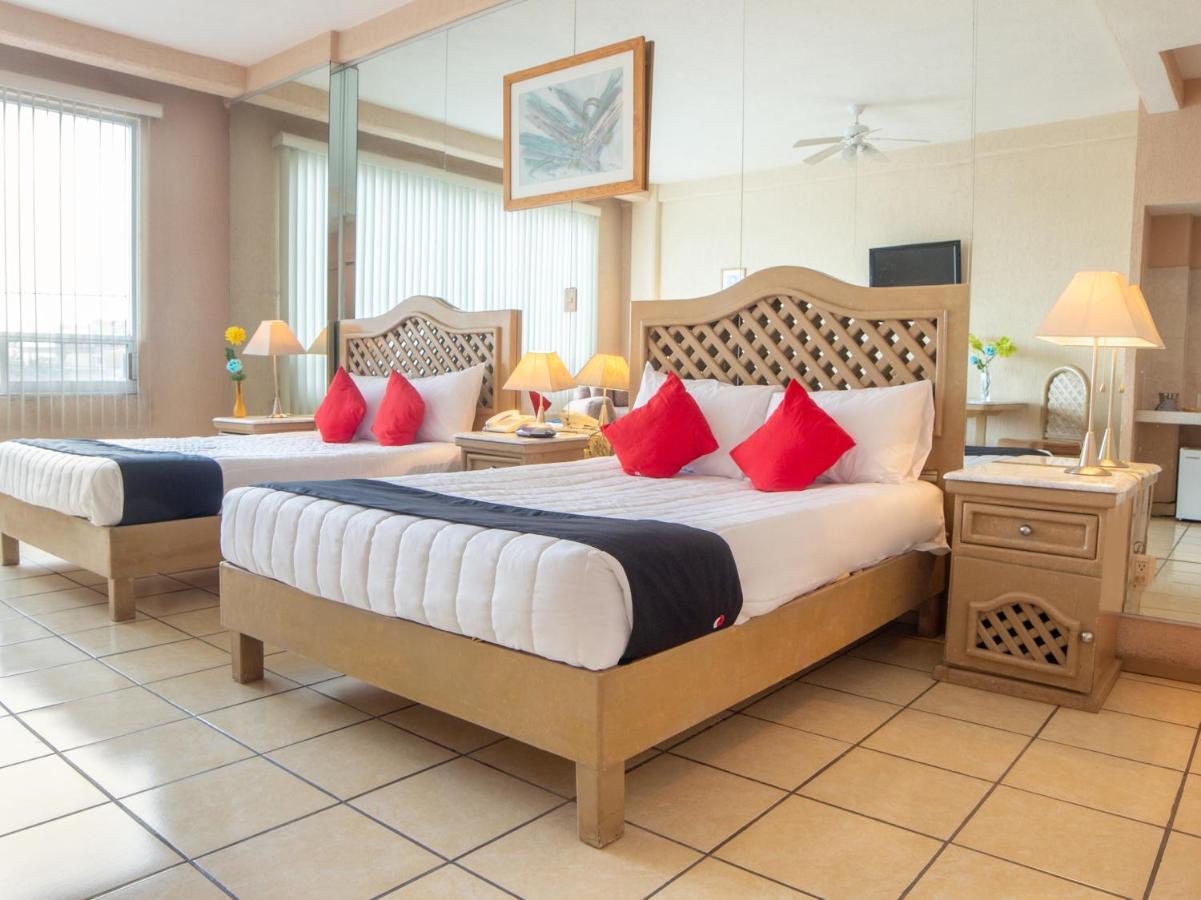 Capital O Hotel Villa Monini Πουέμπλα Εξωτερικό φωτογραφία