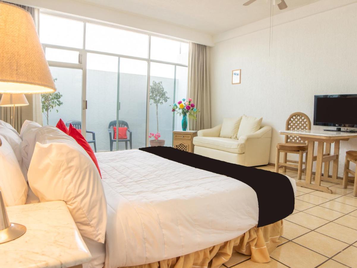 Capital O Hotel Villa Monini Πουέμπλα Εξωτερικό φωτογραφία