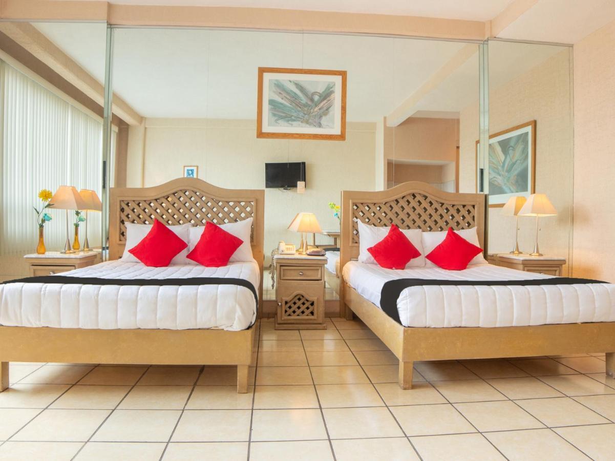 Capital O Hotel Villa Monini Πουέμπλα Εξωτερικό φωτογραφία