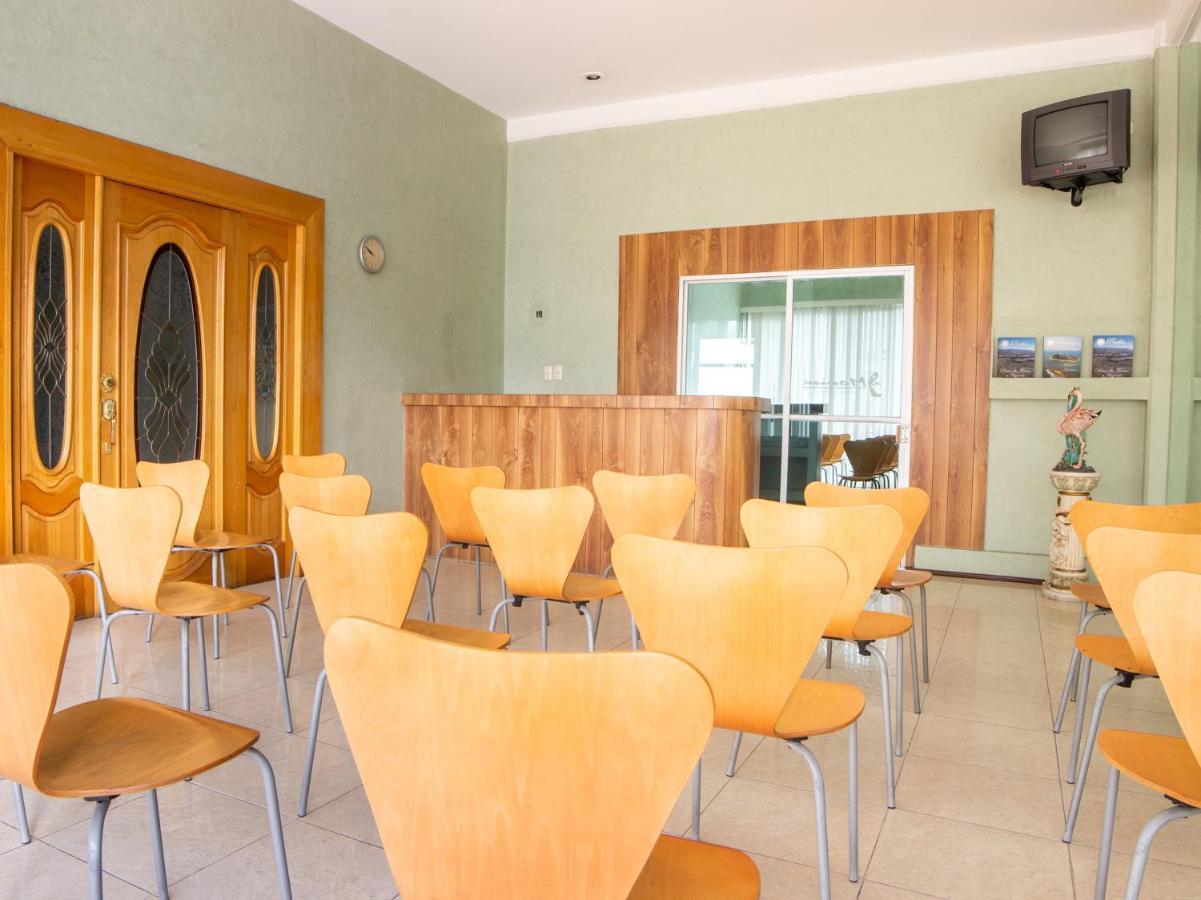 Capital O Hotel Villa Monini Πουέμπλα Εξωτερικό φωτογραφία