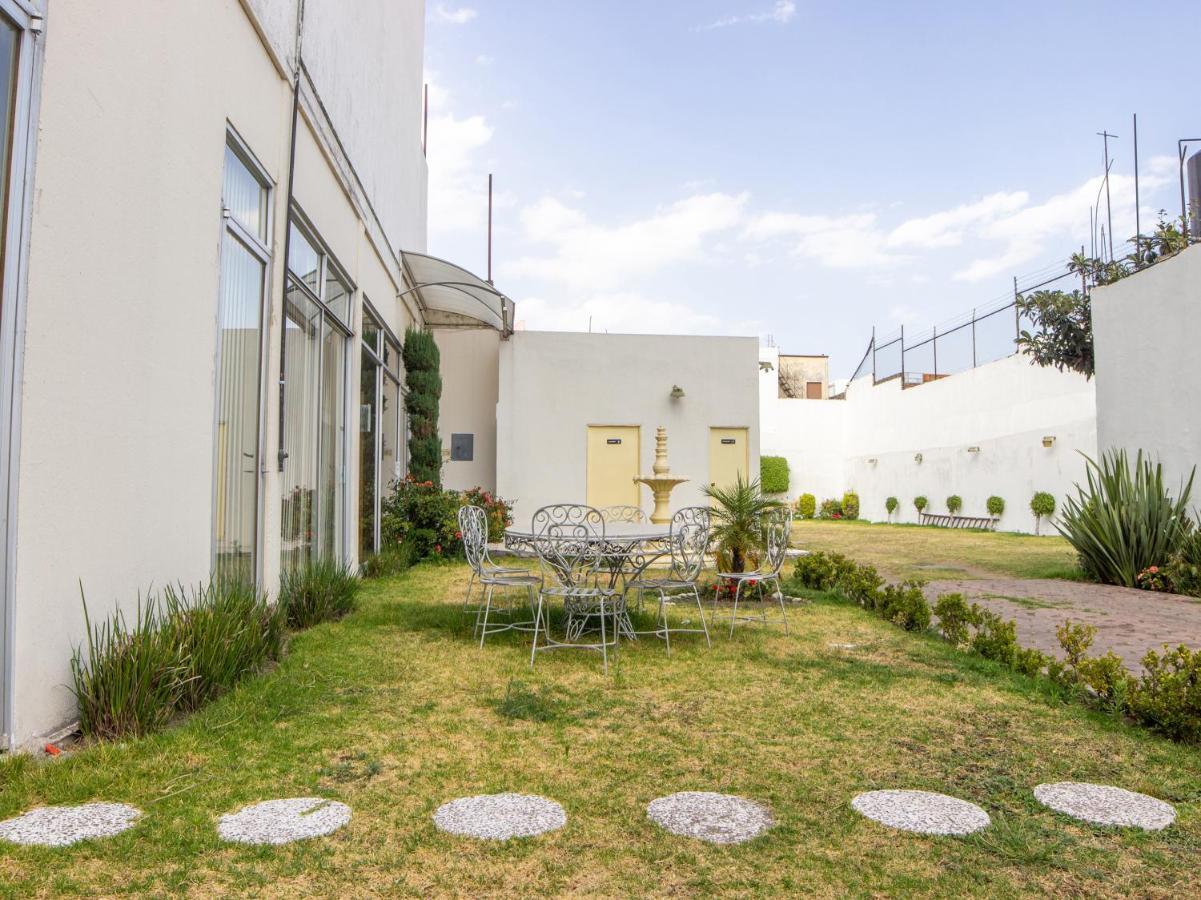 Capital O Hotel Villa Monini Πουέμπλα Εξωτερικό φωτογραφία