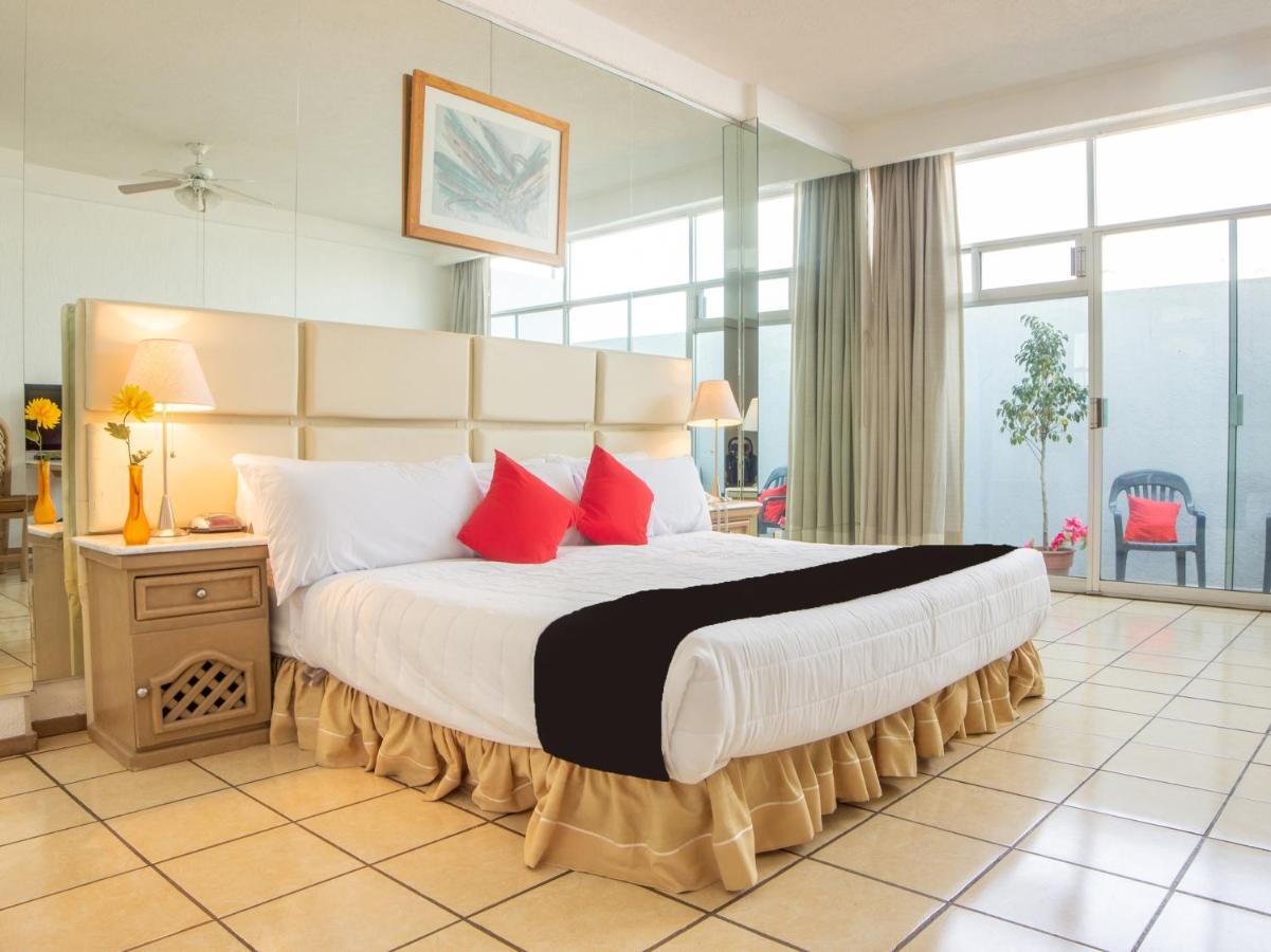 Capital O Hotel Villa Monini Πουέμπλα Εξωτερικό φωτογραφία