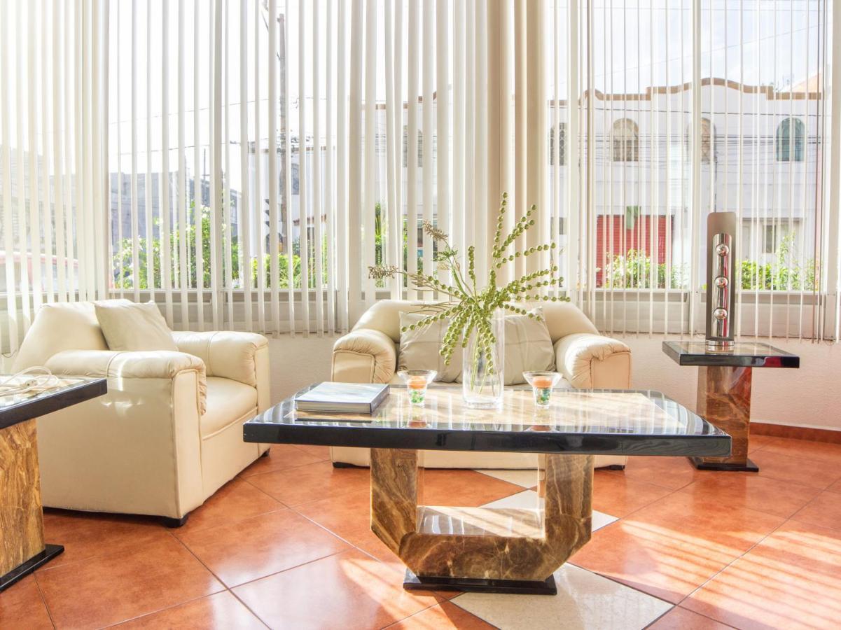Capital O Hotel Villa Monini Πουέμπλα Εξωτερικό φωτογραφία