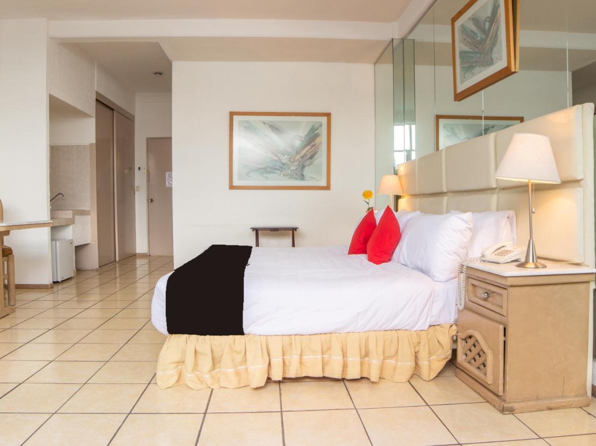 Capital O Hotel Villa Monini Πουέμπλα Εξωτερικό φωτογραφία