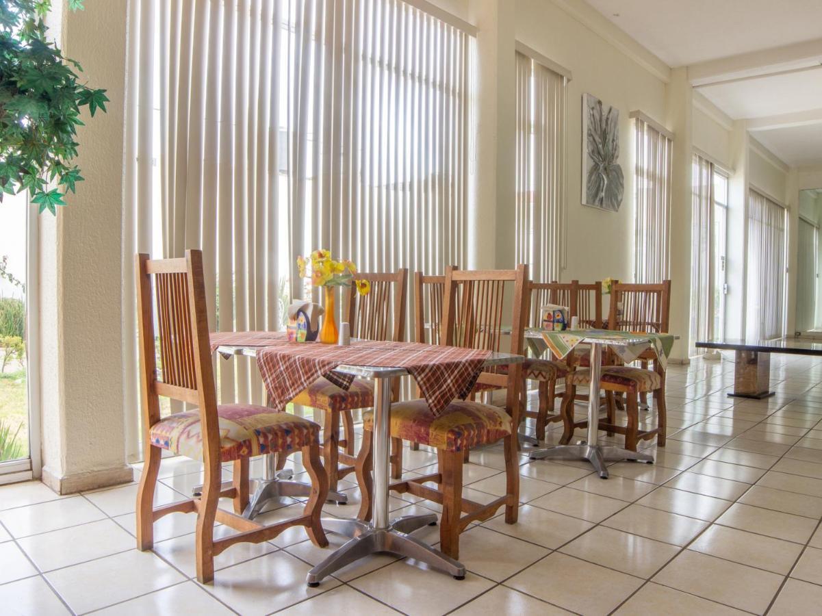 Capital O Hotel Villa Monini Πουέμπλα Εξωτερικό φωτογραφία
